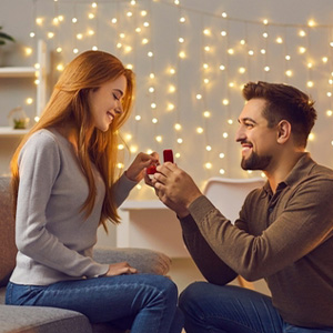 A man proposing to a woman with a ring, representing Texas probate marriage laws.